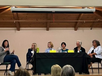 Photo 3: Moderator Daphne Ross hosts a round-table for all the candidates present on the topic Running for Office While Female. L-R: Jessica Speiser, Candidate for Santa Clara County Board of Education; Alex Levitch, Li Zhang, candidates for Mountain View-Los Altos High School District Board; Grace Mah,Candidate for Santa Clara County Board of Education; Dr. Carol Somersille, candidate for El Camino Heath District Board.